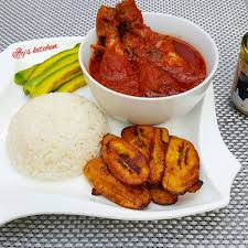 White Rice and stew, plantain, and Chicken 